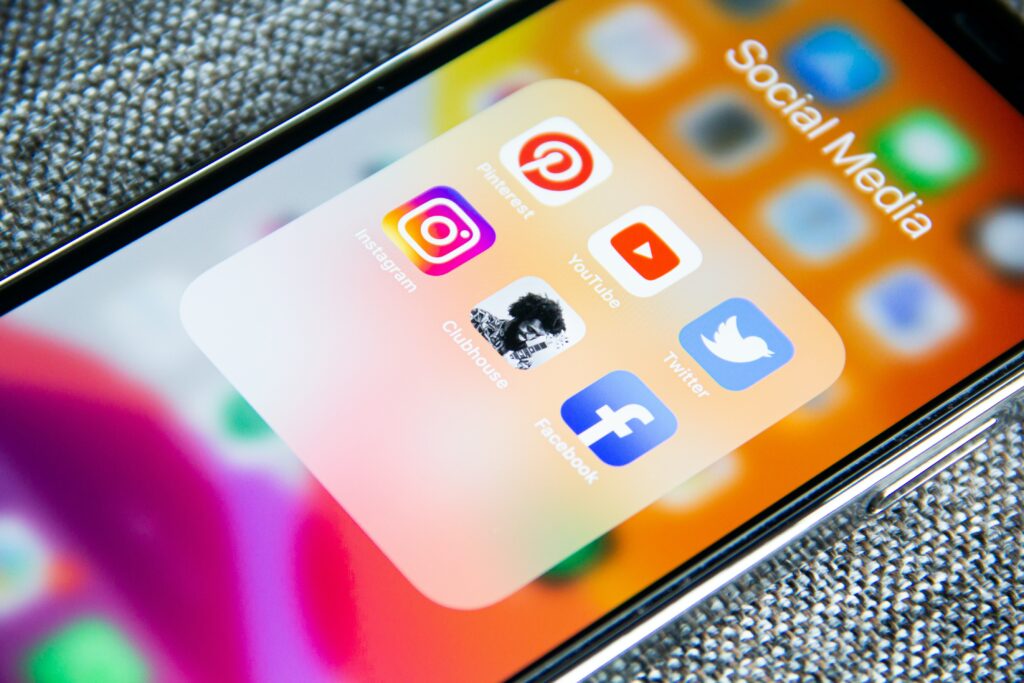 Social media app icons on iPhone display